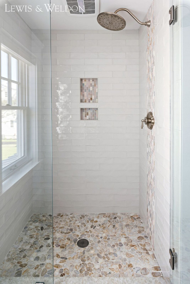 Shower Tile 3x12 hand-made White Crackled ceramic Tile. Shower Tile 3x12 hand-made White Crackled tile glossy, hand-painted appearance and irregular edges add to its rich, old-world look. #showertile #shower #ShowerTiles #3x12tile #handmadetile #WhiteCrackledsubwaytile Lewis & Weldon Custom Kitchens