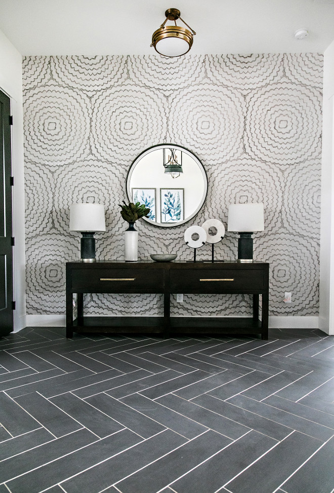 Herringbone tile floor. Entry with herringbone tile floor. This entry features a herringbone floor tile and a beautiful wallpaper. Tile is Arizona Tile Cebu, color: Silver - they were cut down and set on a herringbone pattern. herringbone tile floor. herringbone tile floor #herringbonetilefloor #herringbonetile #herringbonefloor #tile #entry Sita Montgomery Interiors