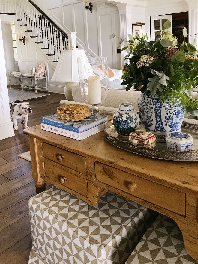 Sofa table decor. Sofa table decor with blue and white ginger jar, design books, glass hurricanes, vintage decir amd table lamp #sofatabledecor Beautiful Homes of Instagram @SweetShadyLane