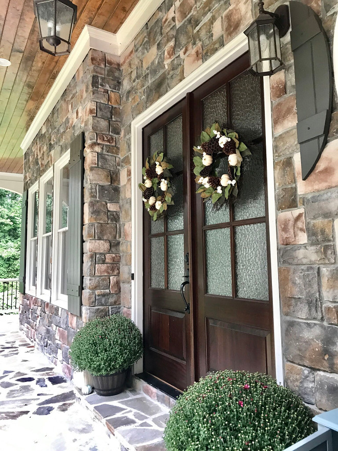 Stone exterior porch with double wood and glass front door. The stone is manufactured from Premier Stone Products in the ruble style in the color Sierra. Stone exterior porch with double wood and glass front door. Stone exterior porch with double wood and glass front door. Stone exterior porch with double wood and glass front door #Stoneexterior #stone #exterior #porch #doublefrontdoor #woodandglassfrontdoor Home Bunch Beautiful Homes of Instagram @mygeorgiahouse