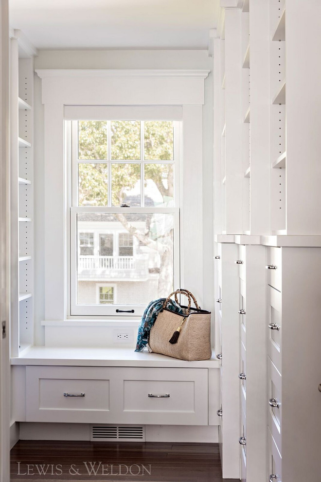 Walk in closet cabinet paint color Benjamin Moore PM-2 White. Custom cabinetry with recessed panel, rounded inside edge detail-Maple painted Benjamin Moore PM-2 White