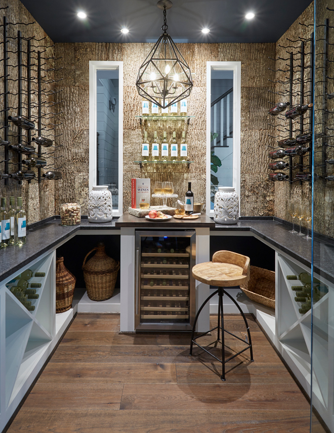 Wine room. Wine room with navy ceiling. Navy ceiling paint color is Sherwin Williams Sea Serpent SW 7615 #wineroom #navyceiling #paintcolor #sherwinwilliamsseaserpentsw7615 Morning Star Builders