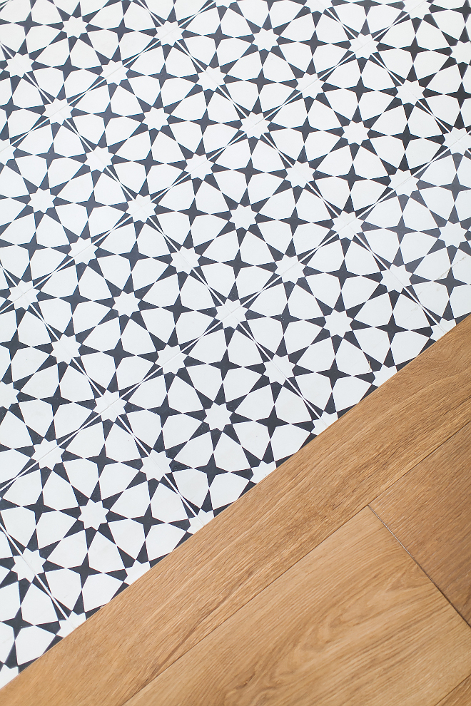 Bedroom hardwood floor transition to master bathroom cement tile floor tile