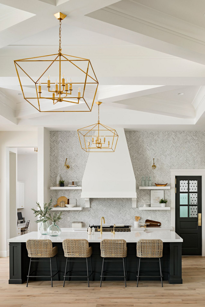 Lighting is Gabby Lighting's Adler chandelier - no longer available in brass - only in bronze. A Finer Touch Construction