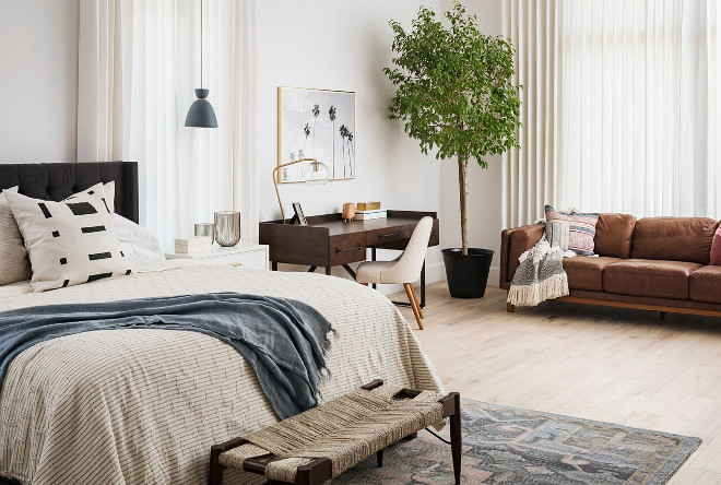 Modern farmhouse bedroom with mid-century inspired furniture. A Finer Touch Construction