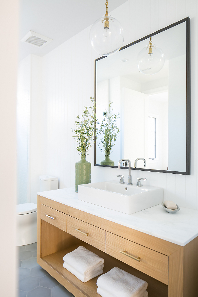 Sleek Modern Farmhouse Bathroom Ideas, This modern farmhouse bathroom looks sleek and very current, I love the custom white oak vanity, the hex floor tiles and the vertical tongue and groove walls, Sleek Modern Farmhouse Bathroom Ideas Sleek Modern Farmhouse Bathroom Ideas Sleek Modern Farmhouse Bathroom Ideas #SleekModernFarmhouseBathroom #ModernFarmhouseBathroom #ModernFarmhouseBathroomIdeas