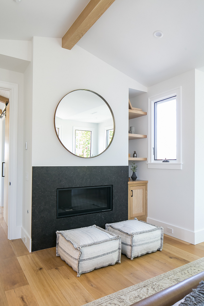 The bedroom fireplace is honed Belgian Limestone