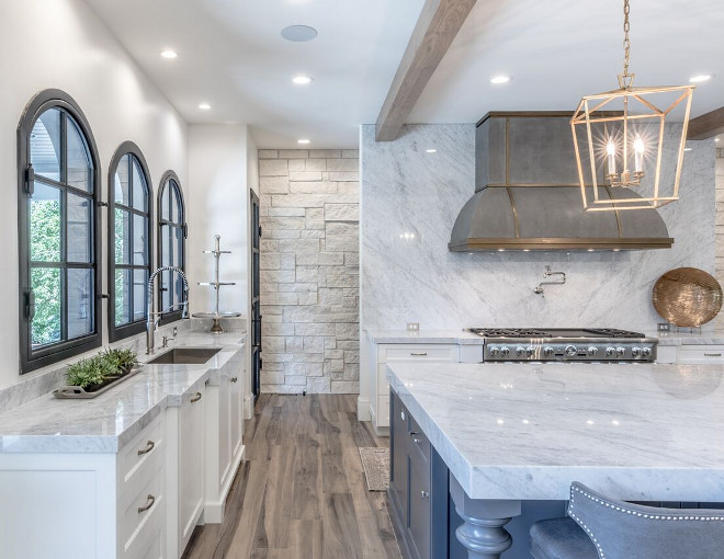 Thick Countertop. Kitchen with thick countertop. This kitchen features thick countertop edge. The countertop edge on perimeter countertops is 2.25″ and 4″ edge on island. Countertop is Carrara Marble slabs. Thick countertop kitchen ideas. Tree Haven Homes & Danielle Loryn Design