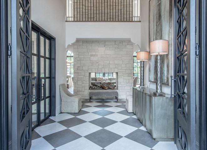White and grey checker tile. Foyer with stone fireplace and White and grey checker tile. White and grey checker tile #Whiteandgreytile #checkertile Tree Haven Homes & Danielle Loryn Design