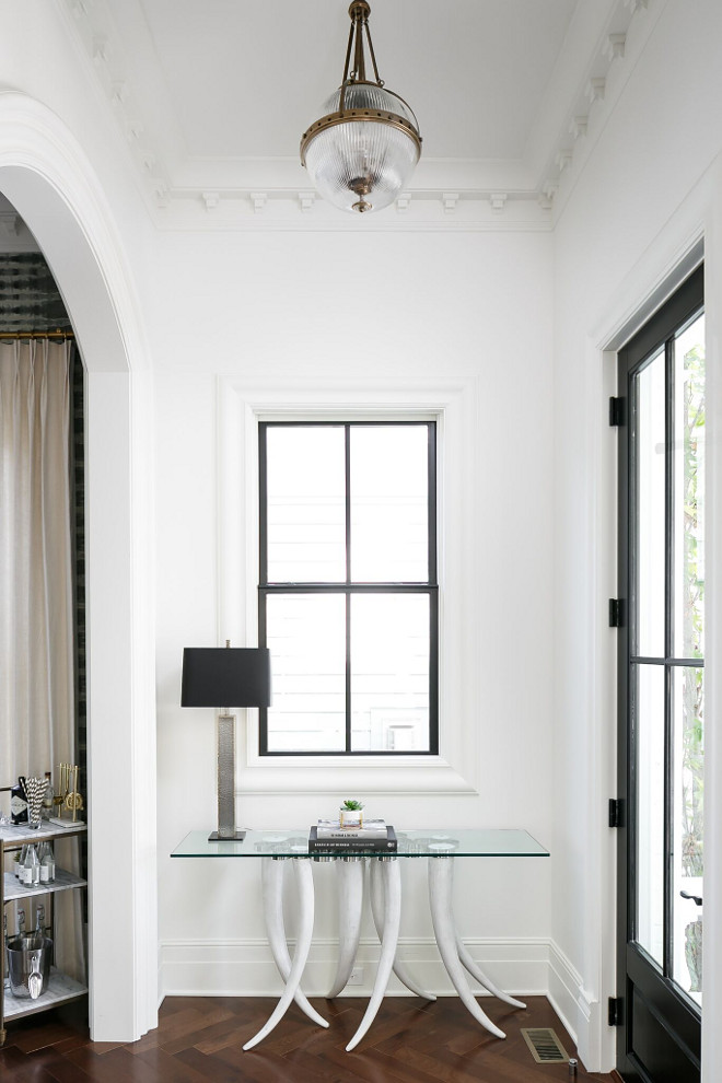 White interiors with black windows. White walls paint color Benjamin Moore OC-57 White Heron with black windows #whiteinteirors #blackwindows Ramage Company