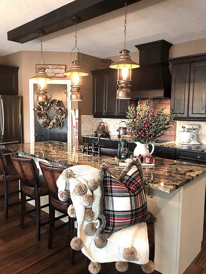 Rustic Kitchen Rustic Kitchen with antique lanterns, granite countertop and dark cabinests Rustic Kitchen
