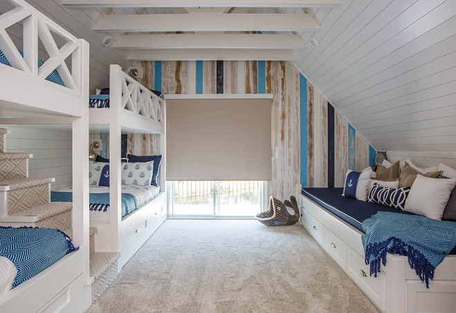 Bunk room with bunk beds and custom built in bed
