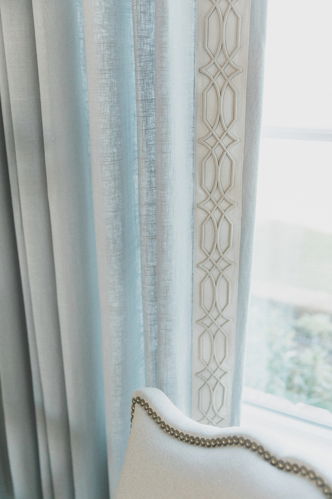 Foyer drapes are a French Blue with a custom embroidered banding on a French rod