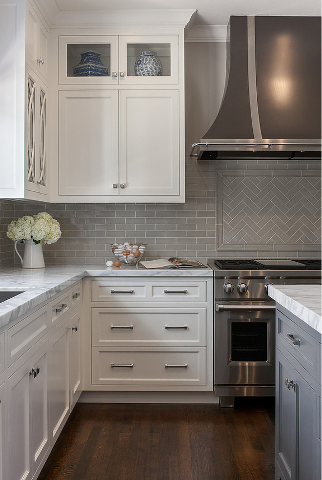 Grey backplash tile kitchen with white marble countertop and grey backplash