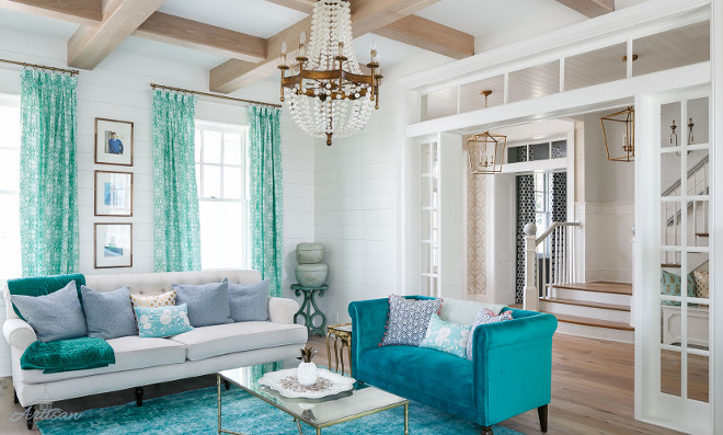 White and turquoise living room with shiplap walls