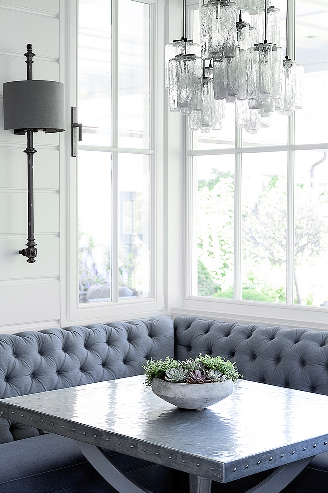 Breakfast room with tufted banquette and zinc top dining table