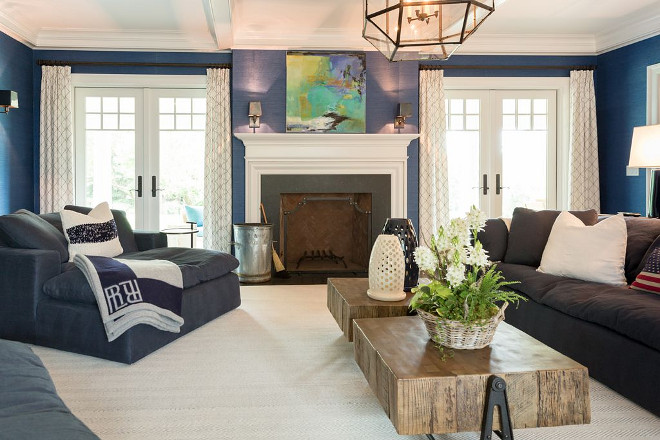 Americana Great Room The room is covered in a navy blue grasscloth wallpaper I love the textures this space features
