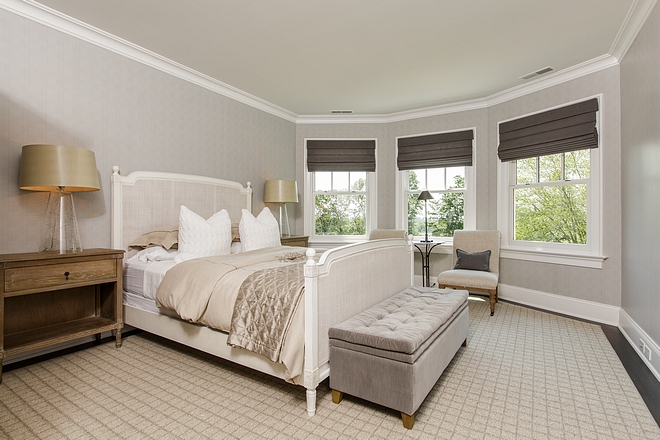 This guest suite features custom rug and bay window