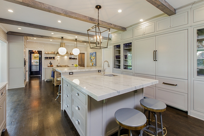 Grey kitchen with two islands Grey kitchen cabinet with two island and ceiling beams grey kitchen