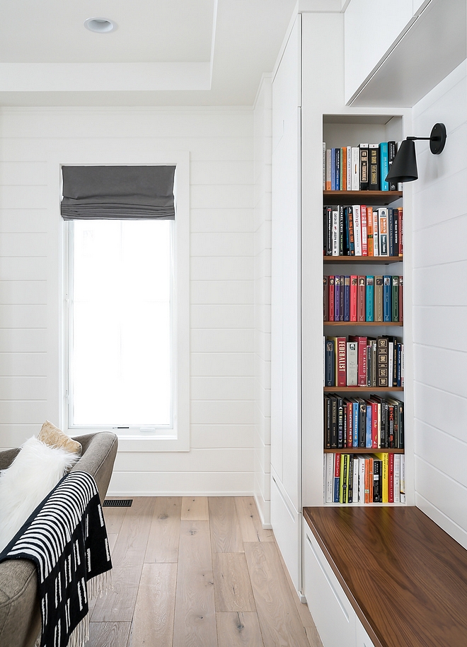 Shiplap are 8" tongue and groove painted with a glossy Simply White by Benjamin Moore