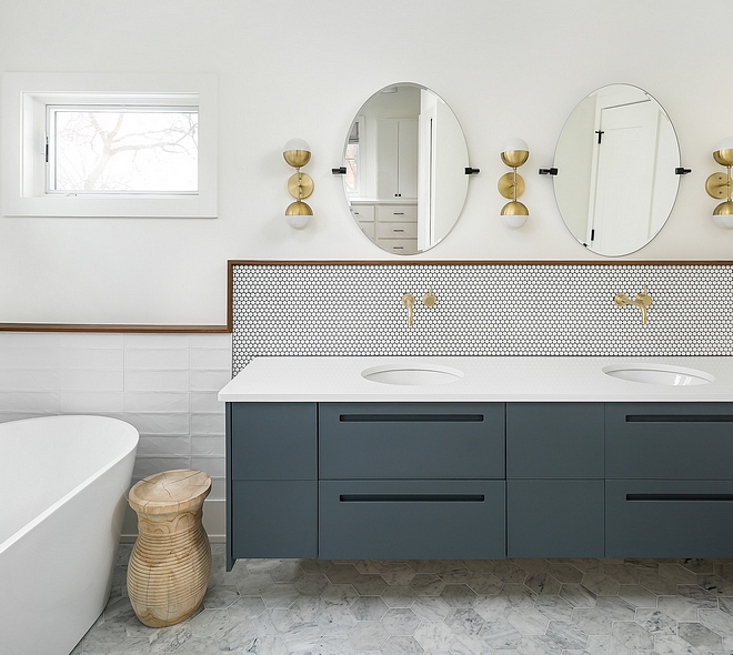 Floating vanity The master bathroom features a double floating vanity Countertop is white quartz
