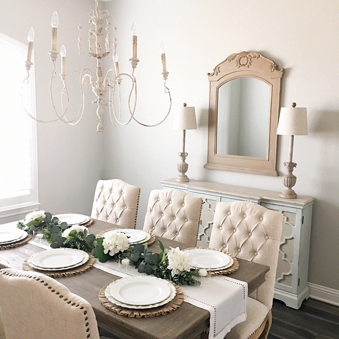 French Country Farmhouse Dining Room with White French Chandelier and neutral furnishings White French chandelier
