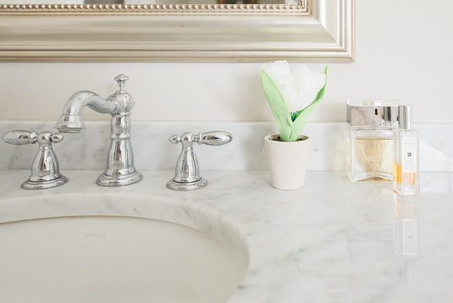 Timeless bathroom classic white marble countertop undermount sink and chrome bathroom faucet sources on Home Bunch