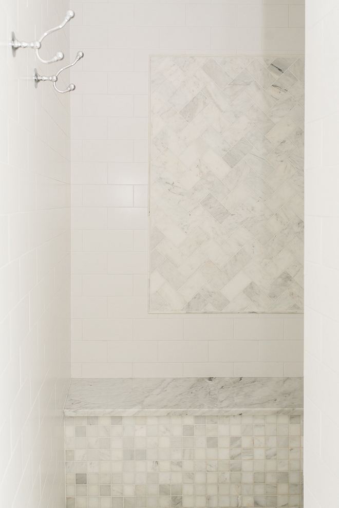 Classic shower combination shower with white subway tile and carrara marble subway tile accent wall marble shower bench #shower #tilecombination #showertile #marbleshower #subwaytileshower #showerbench