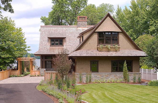 Lakehouse Architecture Design Using historic Excelsior shingle-style lake houses as precedent, TEA2 Architects created a modest 1-1/2 story gabled form with low eaves and upper level rooms that are fully within the roof