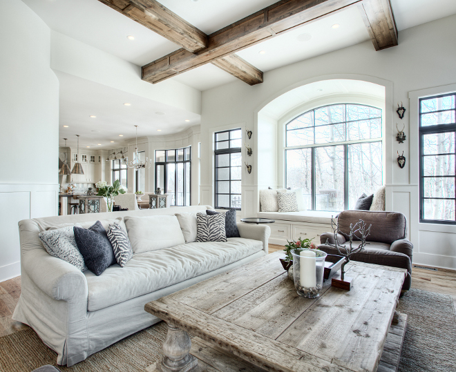 Farmhouse Living Room The beams in this farmhouse living room were out of alder and built-on-site by the builder finishers #farmhouse #livingroom #farmhouselivingroom #ceiling #beams #decor