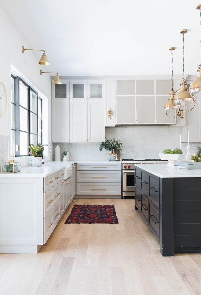 Light grey kitchen with black island and bleached hardwood floors Grey kitchen kitchen Light grey kitchen with black island and bleached hardwood floors #Lightgreykitchen #greykitchen #blackisland #bleachedhardwoodfloors #hardwoodfloors