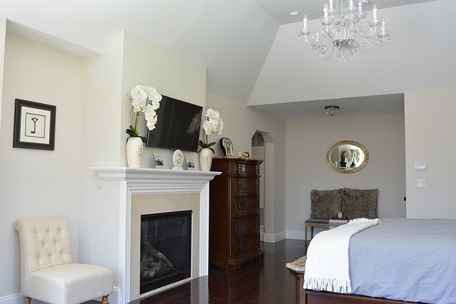 Master bedroom with niche flanking fireplace