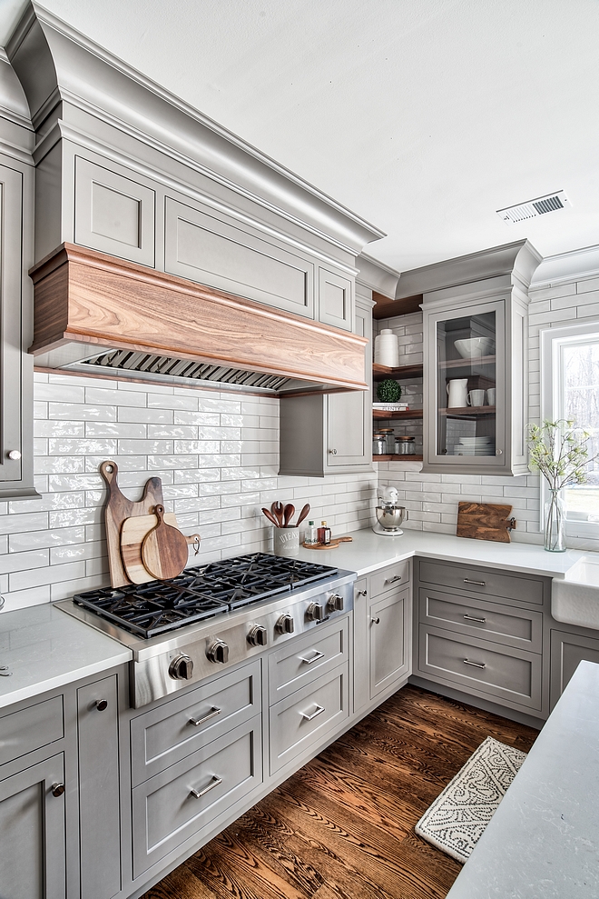 Kitchen hood mantel The custom kitchen hood features a mantel is Natural Walnut hood mantel #hoodmantel #kitchen #hood #kitchenhood