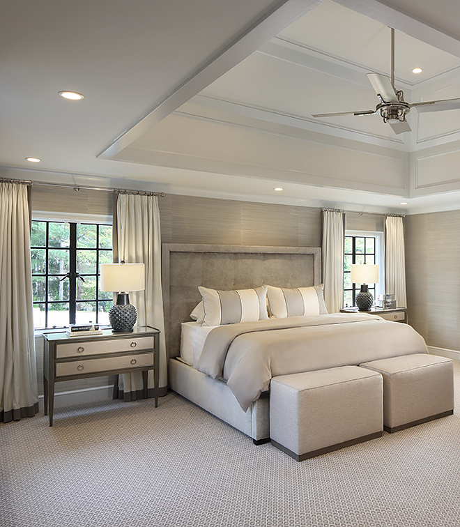  In the master bedroom, the addition of a vaulted ceiling with an applied moulding detail takes this room to the next level The master bedroom now feels much more grand and open A neutral color palette with contrasting colors of grey and black keep this room serene yet sophisticated