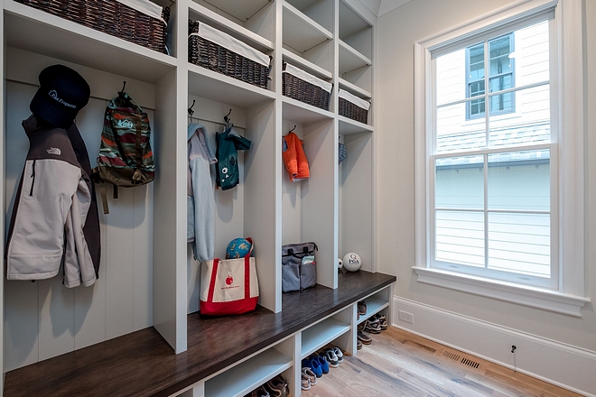Mudroom A large home needs lots of storage and there is nothing better than a custom drop zone space with plenty of room for all your coats and shoes #mudroom