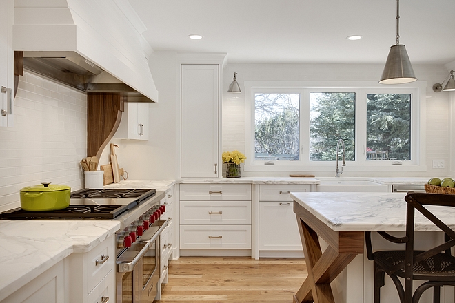 White Kitchen with Walnut accents on corbels and on island