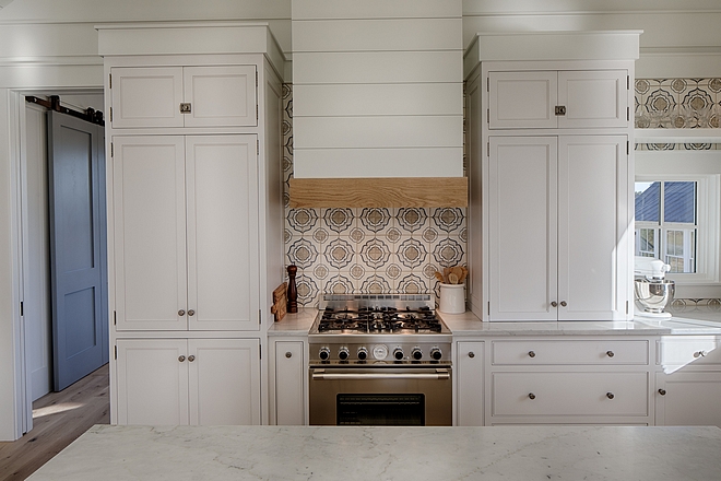 Kitchen range is from Italy - "Tecnogas Superiore" and the shiplap kitchen hood with White Oak mantel is custom