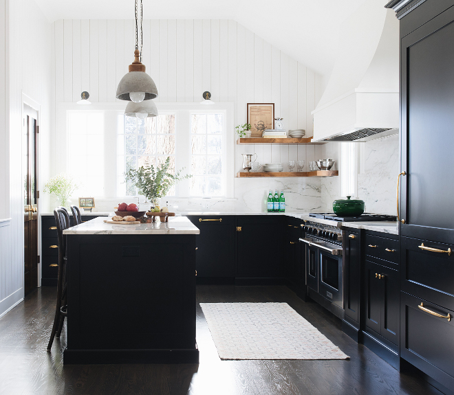 Black Farmhouse Kitchen White shiplap walls ceiling and trim are painted in Benjamin Moore Simply White