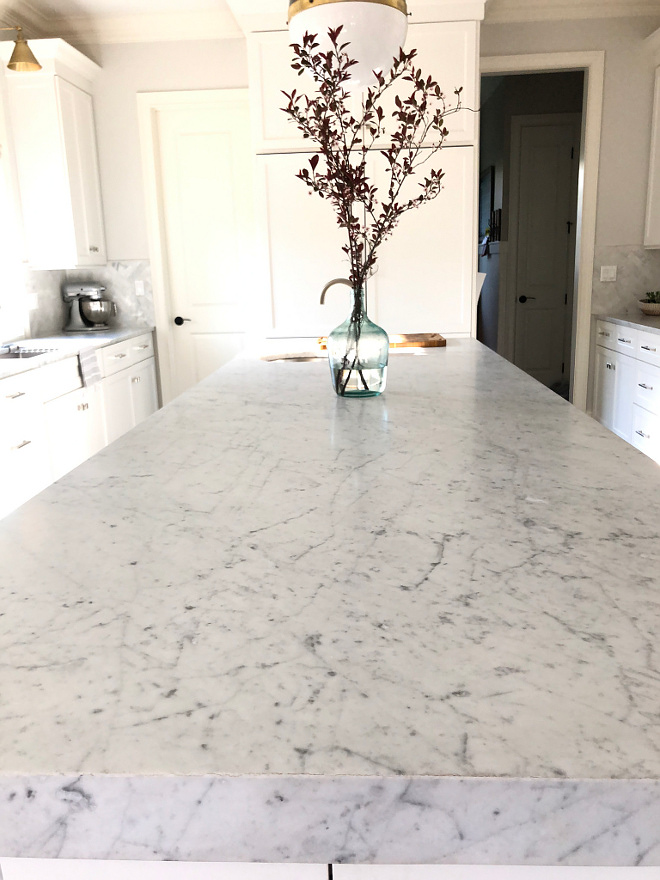 Countertop Carrara marble counters and other side of island HONED MARBLE, 3 inch mitered wedge Countertop is Honed Carrara marble - Side of islands have 3 inch mitered wedge #countertop