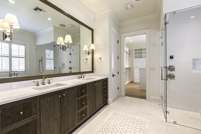 Master bathroom The master bathroom is located between the master bedroom and a large walk-in closet Cabinetry is custom, Ash stained #Masterbathroom