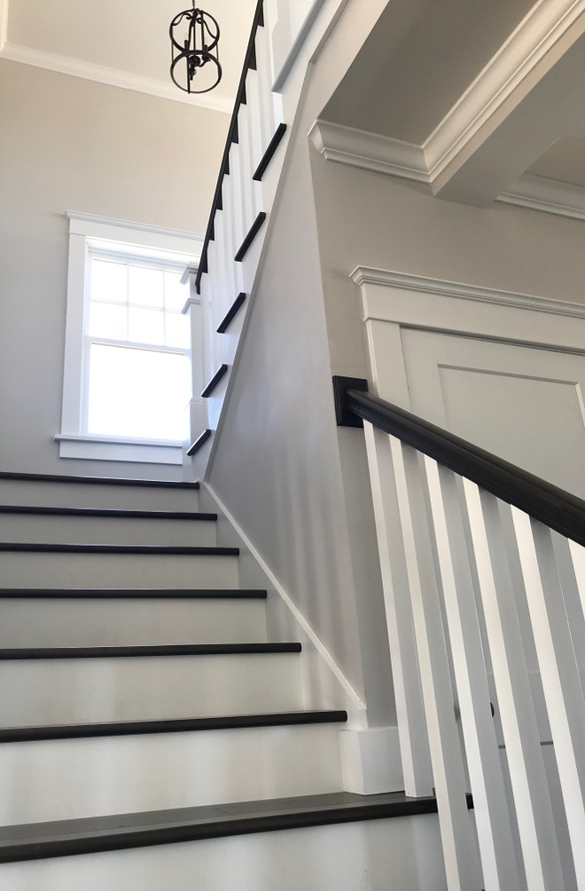 The railing is custom stained to match the walnut stair treads We chose to use open stairs to highlight the exposed walnut treads We also love the contrast of the white woodwork against the dark wood flooring #railing #stair #staircase #walnutstairtreads #stairtreads
