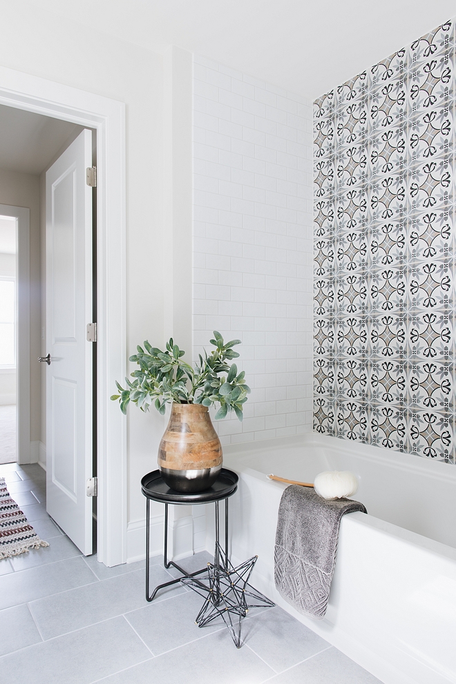 Affordable bathroom renovation ideas Using Encaustic Cement tiles as an accent gives the look of the very expensive bathroom without crushing your budget #bathroomrenovation #affordablerenoideas