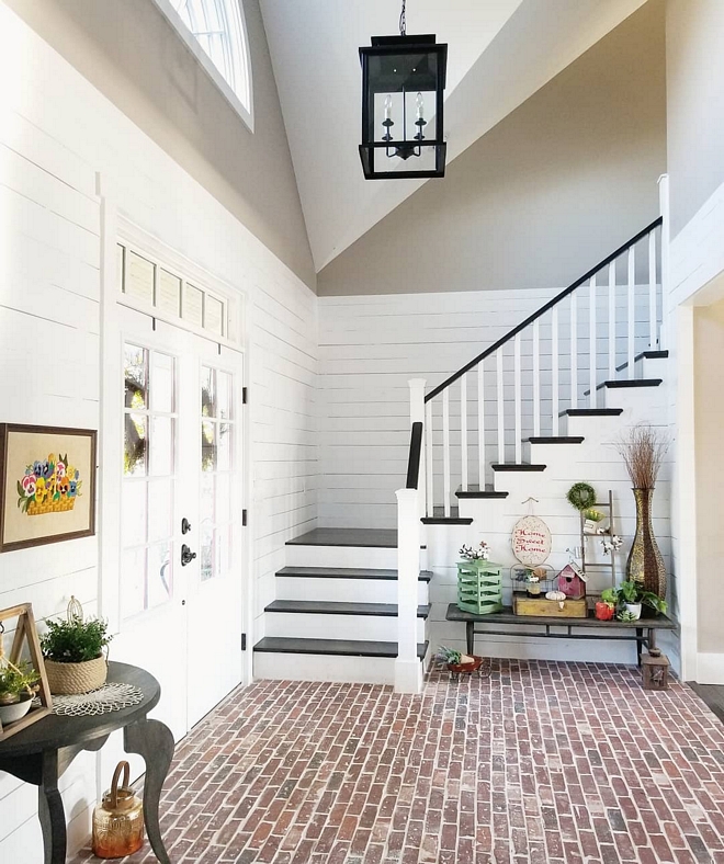 Shiplap wall with brick flooring We added real shiplap and painted it in Sherwin Williams Extra White in the two story foyer as well to give the brick a softer contrast Foyer Shiplap wall with brick flooring #Shiplap #brickflooring