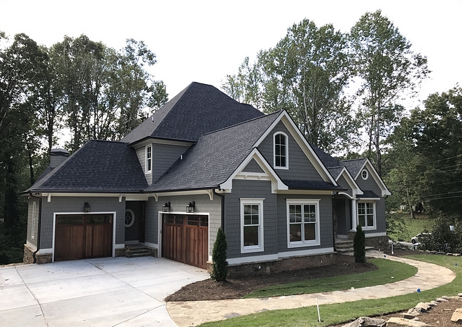 Gorgeous roof lines, transoms and round windows combine you give you a Traditional house plan with terrific curb appeal