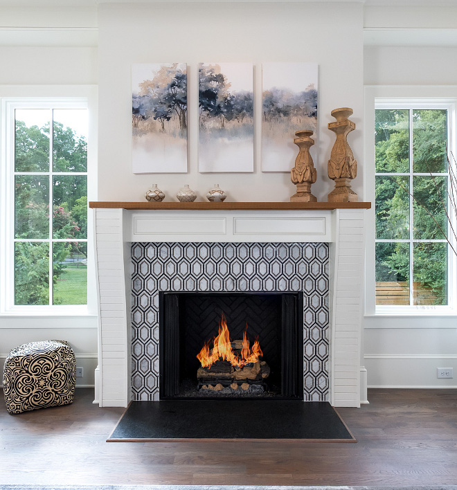 Fireplace Geometric Tile The focal point of this space is the gas log fireplace with designer tile surround #Fireplace #GeometricTile