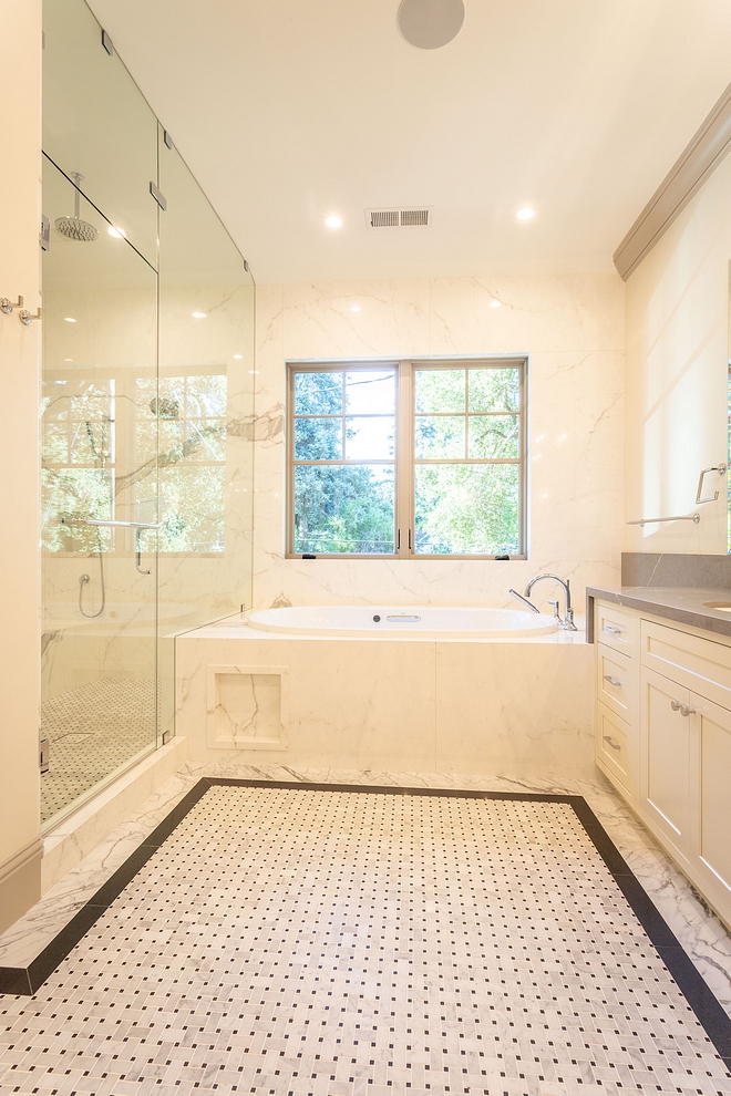 Bathroom Tile Bathroom Floor Tile Bathroom Tiling Bathroom floor tile is a combination of marble basketweave, Absolute Black Granite and Statuario Marble porcelain tile #bathroomtile #bathroomfloortile #bathroomtiling