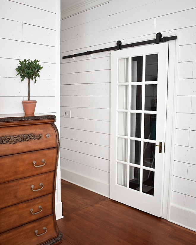 I reused every single original door that was found in the cottage For my master closet and master bath, I repurposed two of the original French doors that led into the dining area By placing them on barn door tracks, I was able to save space in these areas