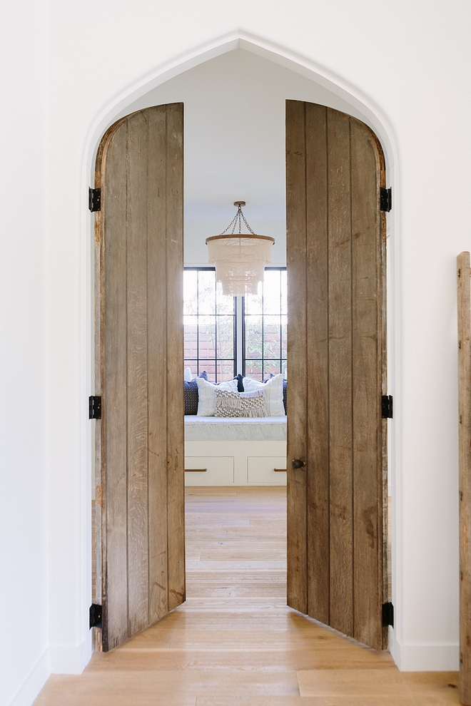 Arched vintage doors Add Old vintage doors in a new home to add patina Arched vintage doo ideas #Archedvintagedoors #vintagedoors