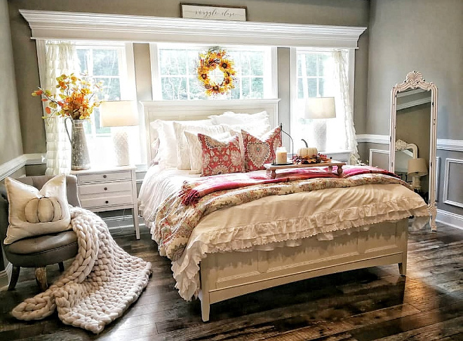 Farmhouse Bedroom Fall decorating is so easy. I use a plain white comforter and add color by folding blankets at the foot of the bed and seasonal pillows. I love a bedroom filled with natural light