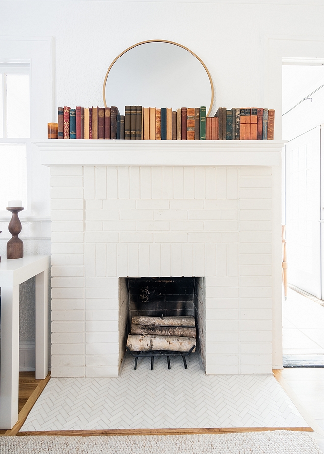 White Brick Fireplace Paint Color Behr Ultra Pure White #WhiteBrickFireplace #WhiteBrickFireplacePaintColor #BehrUltraPureWhite